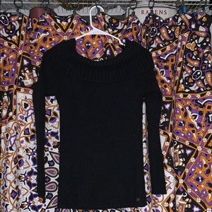 Long sleeve off the shoulder sweater.